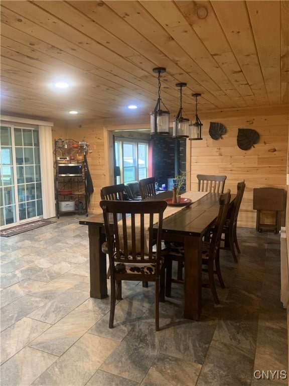 376 State Route 34, Hannibal, NY 13074 - dining space featuring wooden walls, wooden ceiling, and recessed lighting