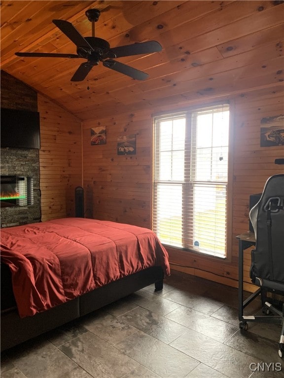 376 State Route 34, Hannibal, NY 13074 - bedroom featuring a fireplace, wood walls, vaulted ceiling, and wood ceiling