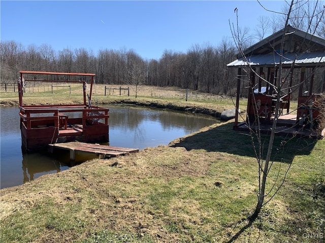 376 State Route 34, Hannibal, NY 13074 - view of dock with a lawn, a water view, and a wooded view