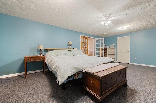 bedroom featuring carpet flooring, baseboards, ceiling fan, and a textured ceiling