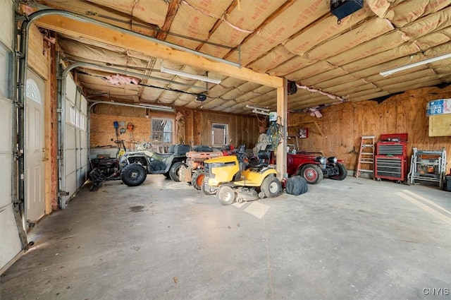 garage featuring a garage door opener