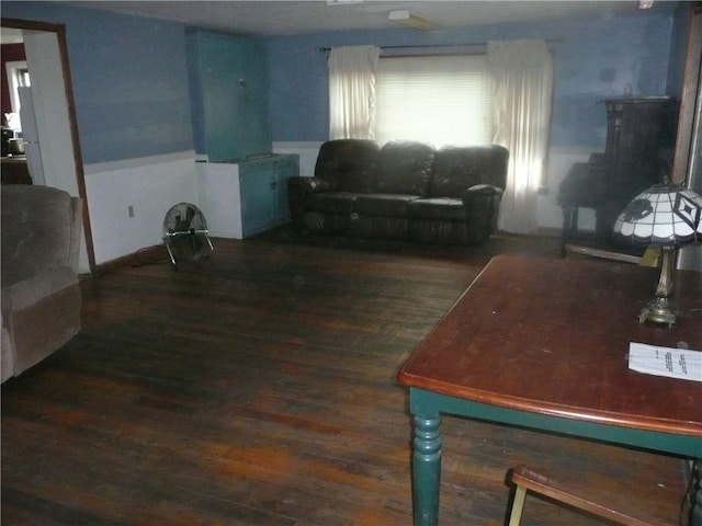 1268 County Road 19, Dix, NY 14812 - living room featuring a wainscoted wall and wood finished floors