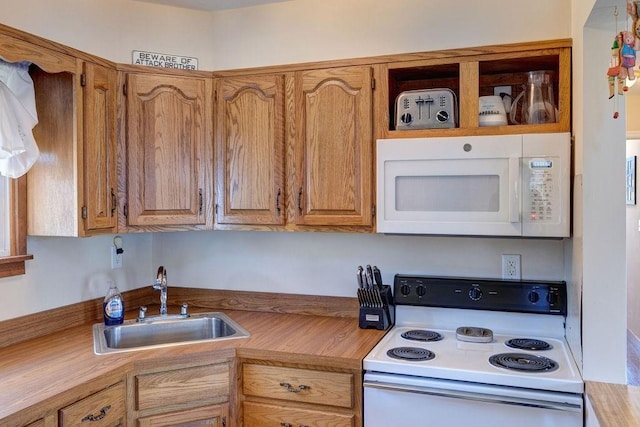 359 Squire Hill Rd, Roxbury, NY 12474 - kitchen featuring light countertops, electric range, a sink, white microwave, and brown cabinetry