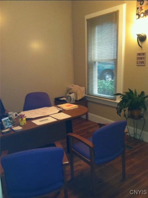 office featuring wood finished floors and baseboards