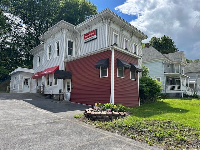 205 W Main St, German Flatts, NY 13357 - view of side of property with a lawn