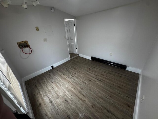317 W State St, Albion, NY 14411 - unfurnished room featuring wood finished floors, lofted ceiling, and a smoke detector