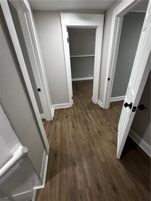 317 W State St, Albion, NY 14411 - hallway featuring wood finished floors and baseboards