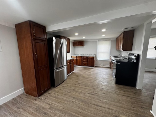 317 W State St, Albion, NY 14411 - kitchen featuring appliances with stainless steel finishes, wood finished floors, and recessed lighting