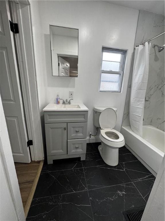 317 W State St, Albion, NY 14411 - bathroom with marble look tiles, vanity, and shower / bath combination with curtain