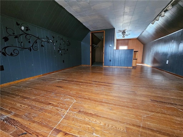 330 Victory Hwy, Erwin, NY 14870 - bonus room with baseboards, lofted ceiling, wood walls, and wood-type flooring