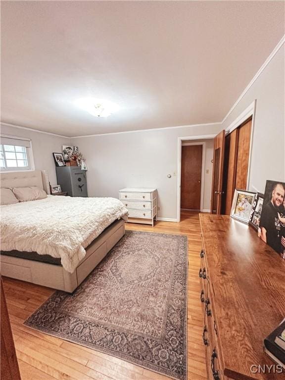 4062 Port St, Richland, NY 13142 - bedroom with light wood-type flooring, crown molding, and baseboards