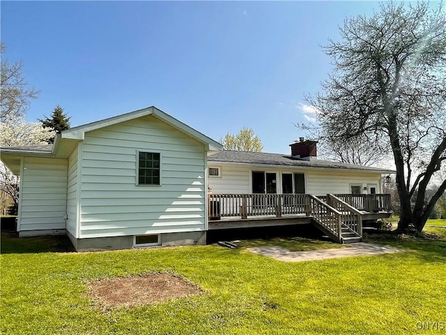4062 Port St, Richland, NY 13142 - rear view of property with a deck, a yard, and a chimney