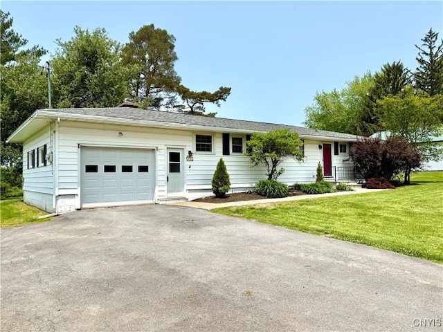 4062 Port St, Richland, NY 13142 - single story home with an attached garage, driveway, and a front yard