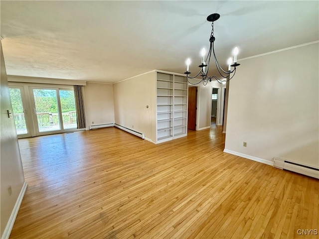 4062 Port St, Richland, NY 13142 - spare room featuring baseboards, light wood finished floors, a chandelier, and ornamental molding