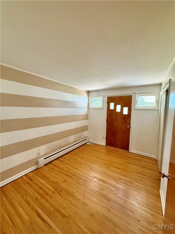 4062 Port St, Richland, NY 13142 - entryway featuring a baseboard heating unit and light wood finished floors