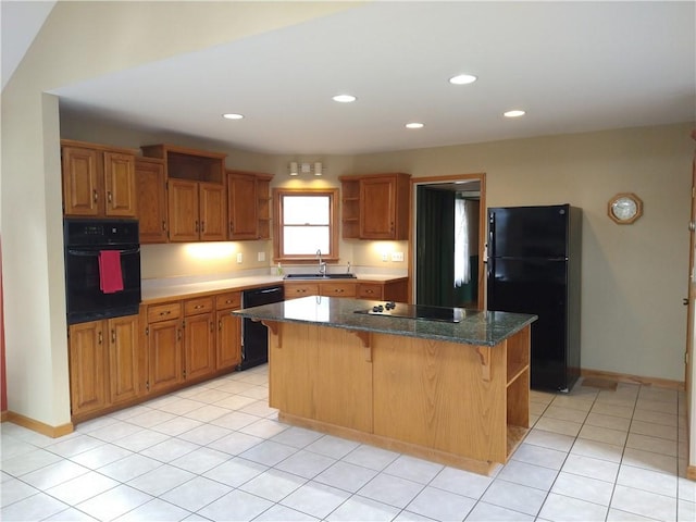 kitchen featuring a sink, open shelves, a kitchen bar, a center island, and black appliances