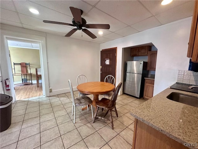 36 Lincoln Ave, Cortland, NY 13045 - dining space featuring recessed lighting, a drop ceiling, light tile patterned floors, and a ceiling fan