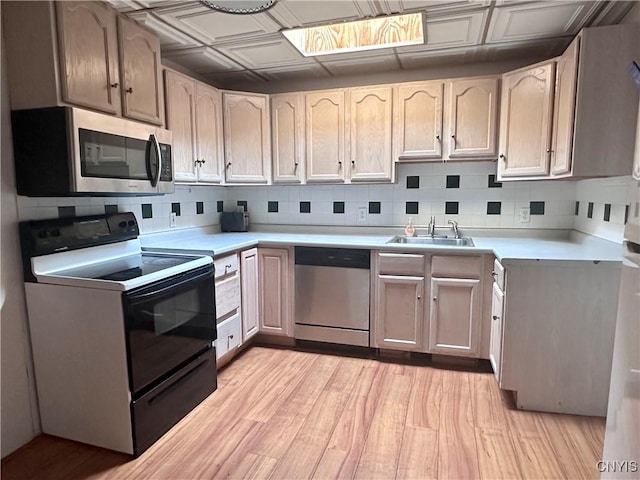 36 Lincoln Ave, Cortland, NY 13045 - kitchen featuring an ornate ceiling, tasteful backsplash, a sink, and stainless steel appliances
