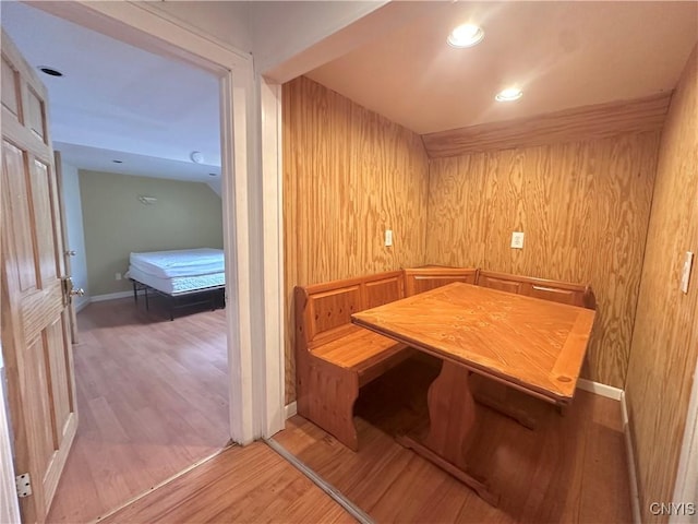 36 Lincoln Ave, Cortland, NY 13045 - dining area featuring recessed lighting, baseboards, breakfast area, wooden walls, and wood finished floors