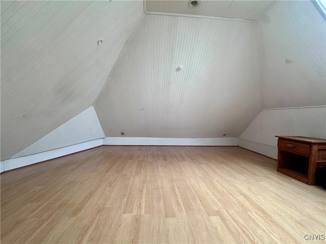 36 Lincoln Ave, Cortland, NY 13045 - additional living space featuring light wood-type flooring and vaulted ceiling