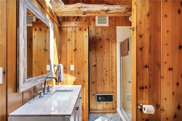 38 Woodchuck Rd, Roxbury, NY 12474 - bathroom with visible vents, a stall shower, vanity, and wood walls