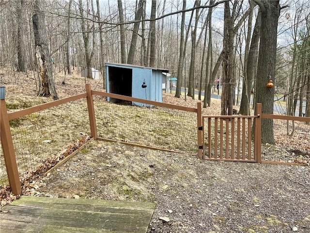 exterior space featuring an outbuilding and a storage shed