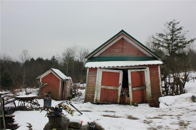 500 Farnham Rd, Sanford, NY 13865 - snow covered structure featuring an outbuilding and a shed