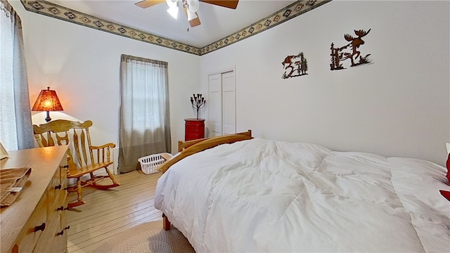 500 Farnham Rd, Sanford, NY 13865 - bedroom with light wood-type flooring, a closet, and a ceiling fan