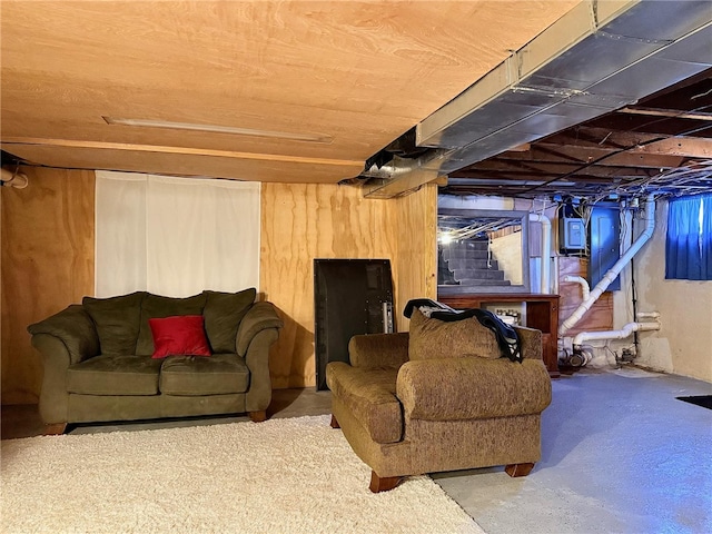 living area with concrete flooring