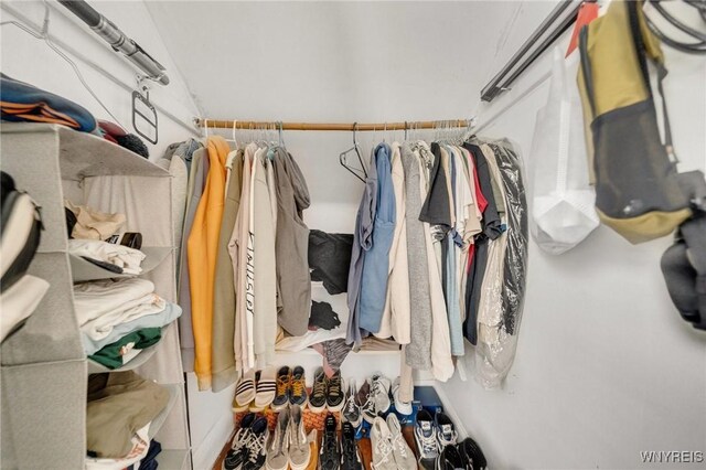 2486 Willow Ave, Niagara Falls, NY 14305 - spacious closet featuring vaulted ceiling