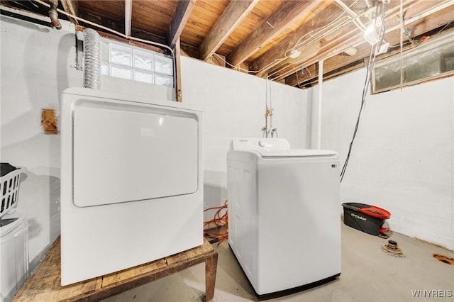 2486 Willow Ave, Niagara Falls, NY 14305 - laundry room with washing machine and clothes dryer and laundry area