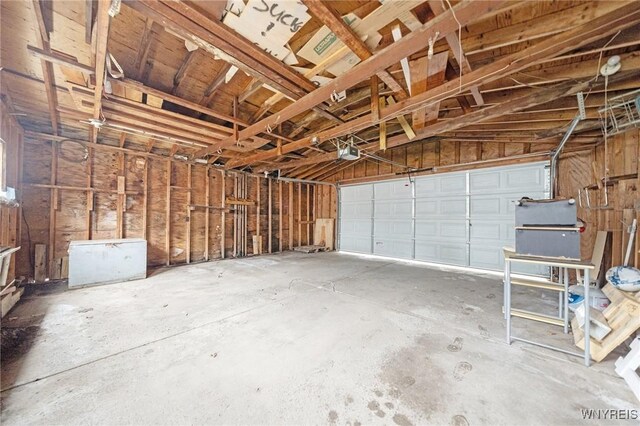 2486 Willow Ave, Niagara Falls, NY 14305 - garage featuring a garage door opener