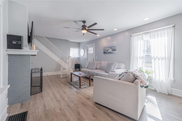 120 Westmont Ave, Elmira, NY 14905 - living area featuring recessed lighting, light wood-style floors, baseboards, stairway, and a ceiling fan