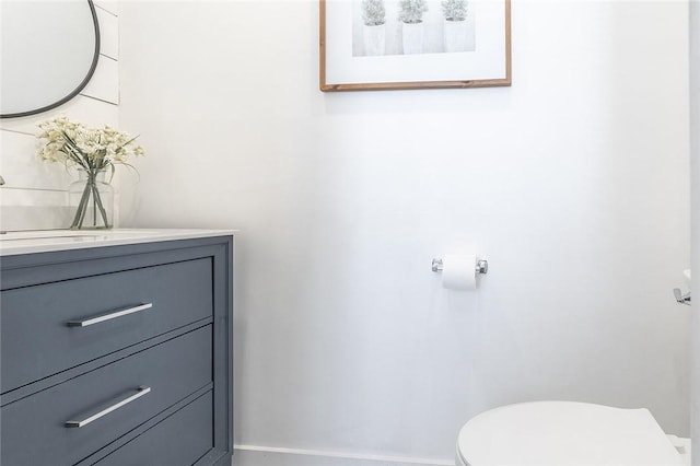 120 Westmont Ave, Elmira, NY 14905 - half bathroom with toilet, vanity, and baseboards