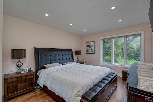 22036 Riverbend Dr W, Le Ray, NY 13601 - bedroom featuring wood finished floors and recessed lighting