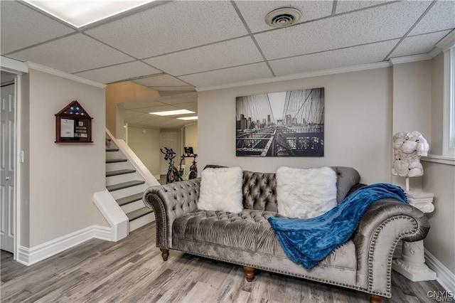 22036 Riverbend Dr W, Le Ray, NY 13601 - living room with visible vents, a drop ceiling, stairway, and wood finished floors