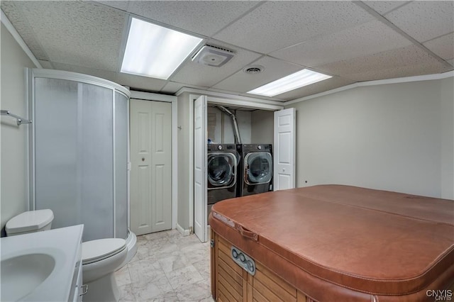 22036 Riverbend Dr W, Le Ray, NY 13601 - interior space with a sink, washing machine and dryer, visible vents, and marble finish floor