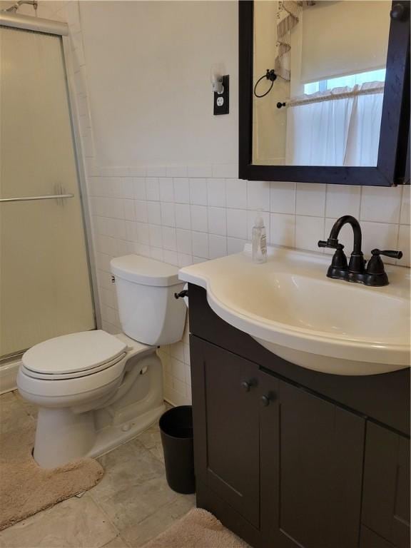 810 River Rd, Sanford, NY 13754 - full bathroom with vanity, a shower stall, tile walls, and a wainscoted wall