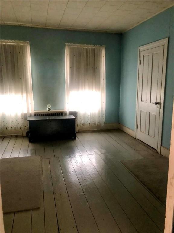 810 River Rd, Sanford, NY 13754 - empty room with hardwood / wood-style floors and baseboards