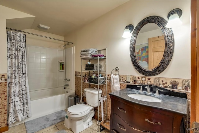 bathroom with toilet, vanity, shower / tub combo, tile patterned flooring, and visible vents