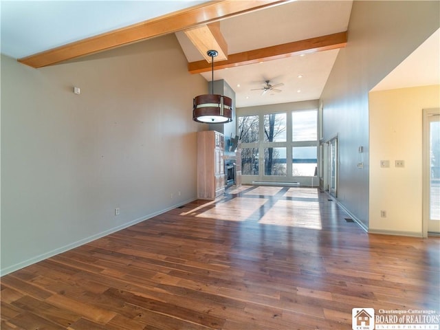 5464 Crestwood Rd, Ellery, NY 14712 - unfurnished dining area featuring baseboards, a ceiling fan, wood finished floors, and beamed ceiling
