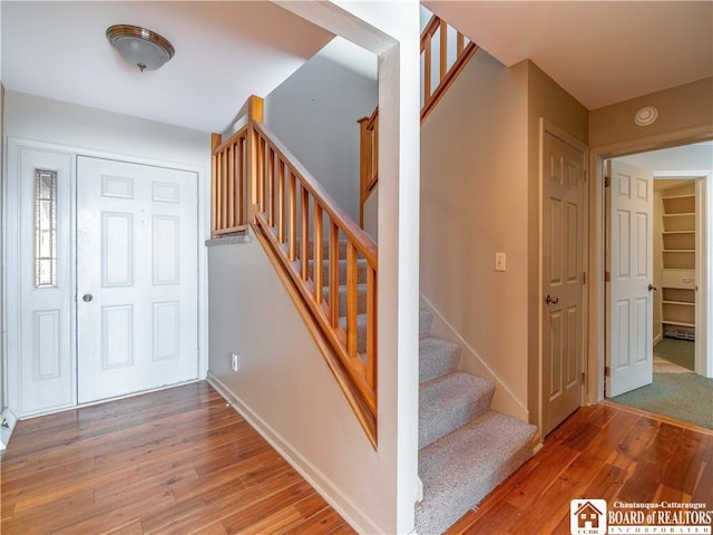 5464 Crestwood Rd, Ellery, NY 14712 - entrance foyer with baseboards, stairs, and wood finished floors