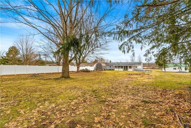 view of yard featuring fence
