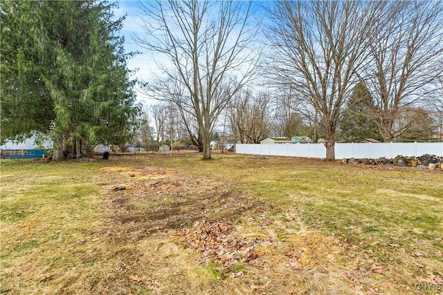 view of yard with fence
