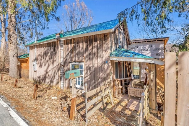view of home's exterior featuring metal roof