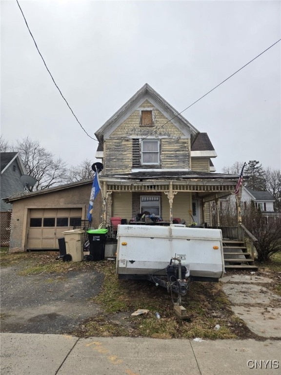 victorian home with a garage