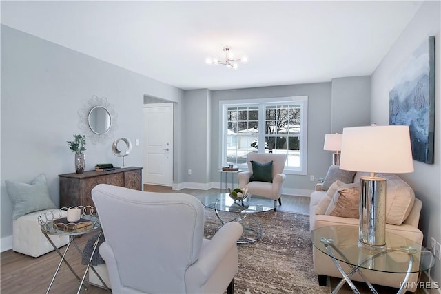 00 Beattie Ave, Lockport-Town, NY 14094 - living area with baseboards, wood finished floors, and a notable chandelier