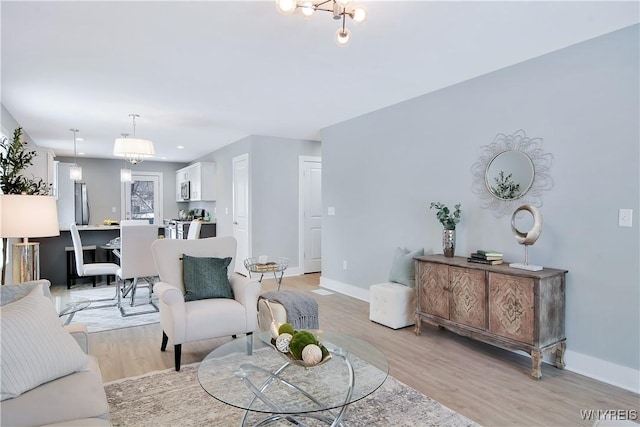 00 Beattie Ave, Lockport-Town, NY 14094 - living area with recessed lighting, baseboards, a chandelier, and light wood-type flooring