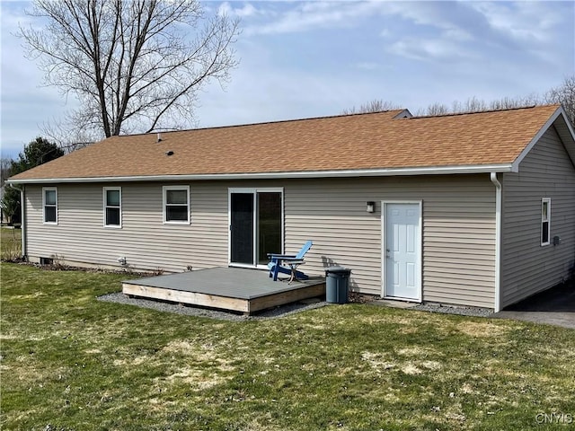 34 Salmon Meadow Ln, Richland, NY 13142 - rear view of house featuring a deck, roof with shingles, and a lawn