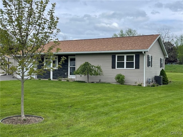 34 Salmon Meadow Ln, Richland, NY 13142 - ranch-style home with a front lawn, roof with shingles, and central AC unit